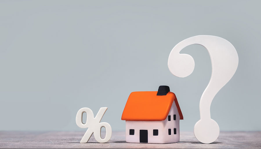 Maison avec le signe pourcentage et un point d'intégration